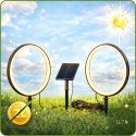 Dekoracyjne oświetlenie solarne Rings LUXA 3000K przy ścieżce ogrodowej