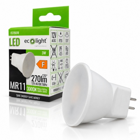 Biała żarówka LED MR11 EcoLight EC79078 z mlecznym frontem i dwoma pinami, przed zielonym pudełkiem z zawieszką, na białym tle z odbiciem.